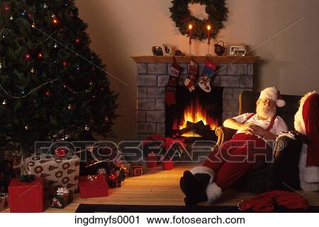 Santa Asleep by the Fireplace View Large Photo Image Stock Image - Santa Asleep by the Fireplace. Fotosearch