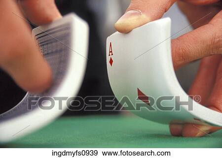 Shuffling a Deck of Cards View Large Photo Image Stock Photo - Shuffling a Deck of Cards. Fotosearch
