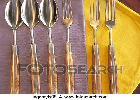 Silverware Laid Out On a Table View Large Photo Image Picture - Silverware Laid Out On a Table. Fotosearch