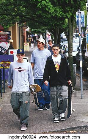 Skateboarders Downtown on Street Corner View Large Photo Image Picture - Skateboarders Downtown on Street Corner. Fotosearch