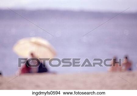Sunbathing on the Beach View Large Photo Image Picture - Sunbathing on the Beach. Fotosearch