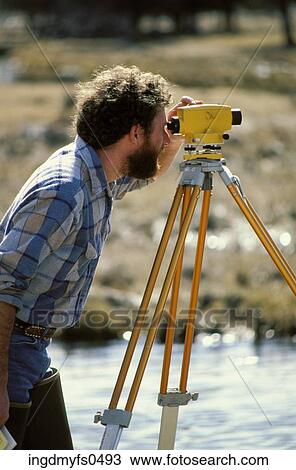 Stock Image - Surveyor at Work. Fotosearch