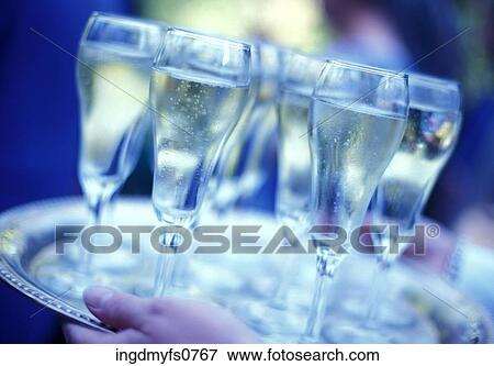 Tray of Champagne Glasses View Large Photo Image Stock Photo - Tray of Champagne Glasses. Fotosearch