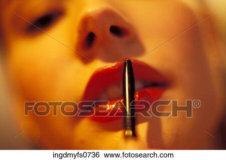 Woman Applying Lipstick View Large Photo Image Stock Photograph - Woman Applying Lipstick. Fotosearch
