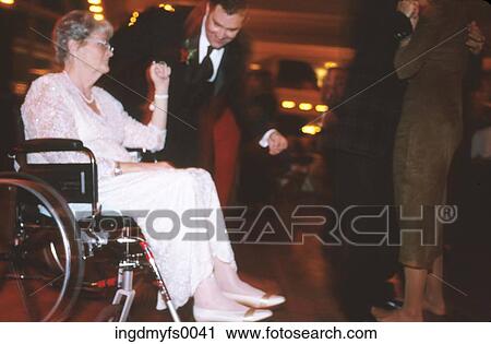 Woman in Wheelchair on Dancefloor View Large Photo Image Stock Image - Woman in Wheelchair on Dancefloor. Fotosearch