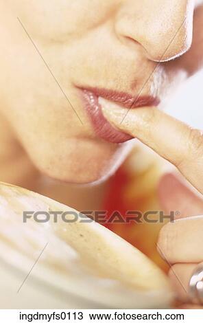 Woman Licking Foam off of Finger View Large Photo Image Stock Image - Woman Licking Foam off of Finger. Fotosearch