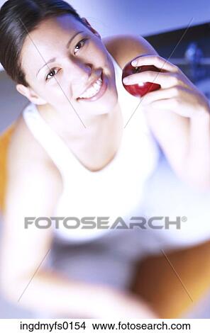 Woman with Apple View Large Photo Image Picture - Woman with Apple. Fotosearch