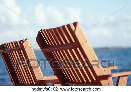 Wooden Chairs by the Ocean View Large Photo Image Stock Image - Wooden Chairs by the Ocean. Fotosearch