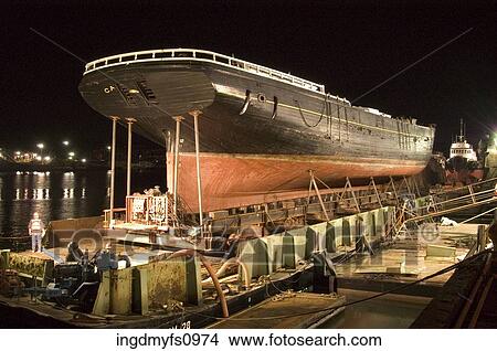 Picture - Working in a Shipyard at Night. Fotosearch