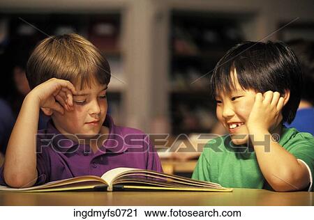Young Boys Studying Together View Large Photo Image Stock Image - Young Boys Studying Together. Fotosearch