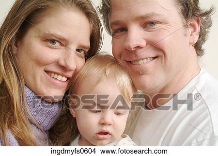 Picture - Young Couple with Baby. Fotosearch