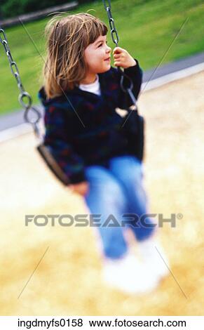 Young Girl on Swing View Large Photo Image Stock Photo - Young Girl on Swing. Fotosearch