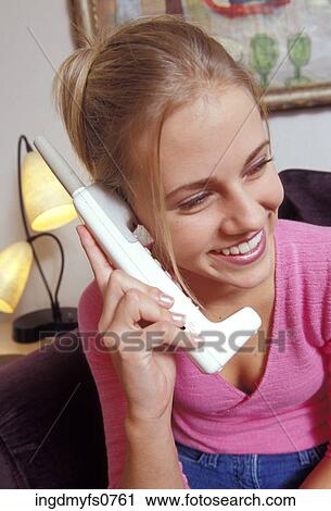 Young Girl Talking on the Phone View Large Photo Image Stock Image - Young Girl Talking on the Phone. Fotosearch