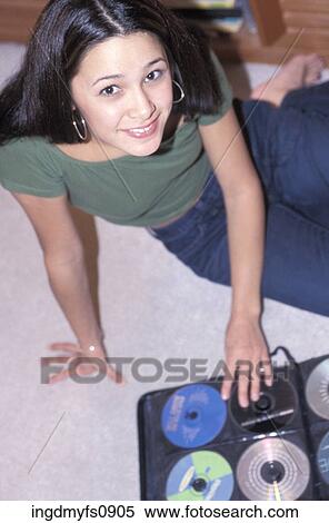 Young Girl with CD Collection View Large Photo Image Stock Photography - Young Girl with CD Collection. Fotosearch
