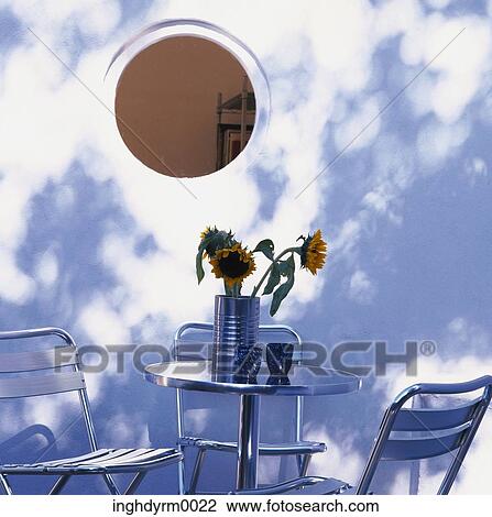 Close-up of a set of garden chairs and table View Large Photo Image Stock Image - Close-up of a set of garden chairs and table. Fotosearch