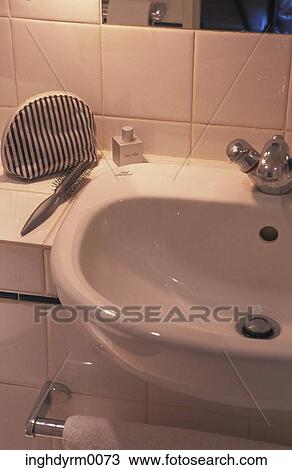 Close-up of a wash basin in a bathroom View Large Photo Image Stock Image - Close-up of a wash basin in a bathroom. Fotosearch