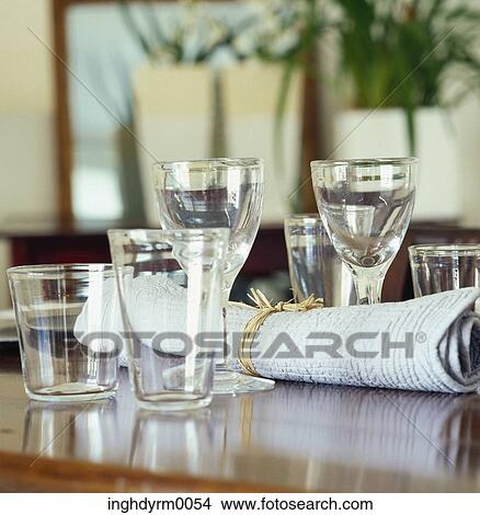Close-up of assorted glasses on a table View Large Photo Image Picture - Close-up of assorted glasses on a table. Fotosearch