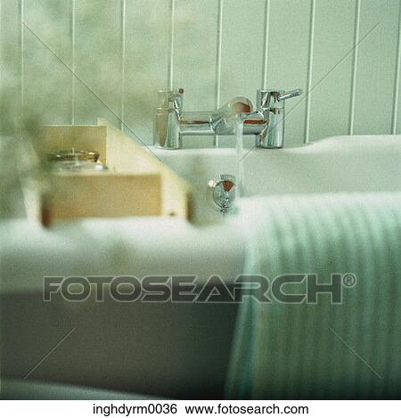 Close-up of steam rising out of a bathtub View Large Photo Image Stock Photograph - Close-up of steam rising out of a bathtub. Fotosearch