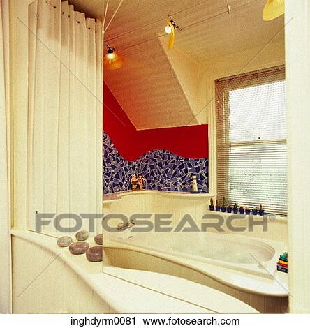 Close-up of the reflection of a bathtub in a bathroom mirror View Large Photo Image Stock Image - Close-up of the reflection of a bathtub in a bathroom mirror. Fotosearch