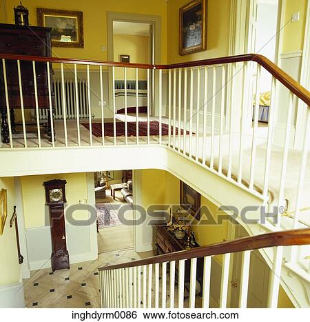 Hand Railing Along A Flight Of Stairs Inside A House Stock