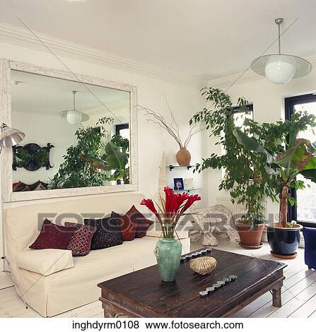 Stock Photo - Potted plants in a white modern drawing room. Fotosearch