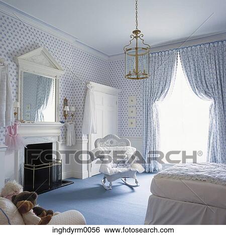 View of a blue and white nursery with a fireplace View Large Photo Image Stock Photograph - View of a blue and white nursery with a fireplace. Fotosearch