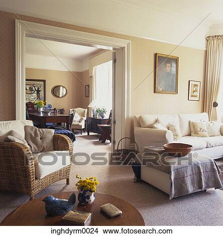View of a dining room through a living room door View Large Photo Image Picture - View of a dining room through a living room door. Fotosearch