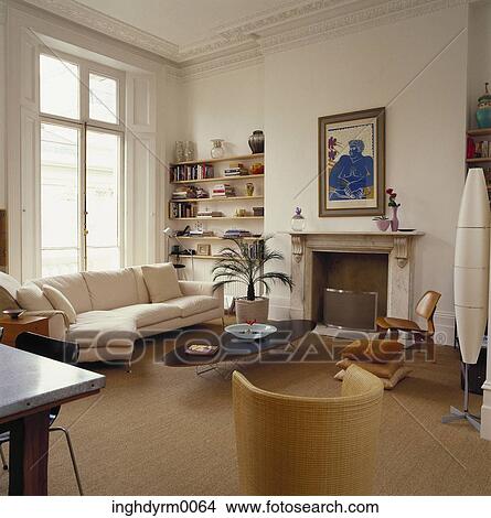 View of a living room with jute flooring View Large Photo Image Picture - View of a living room with jute flooring. Fotosearch