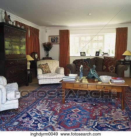 View of a living room with ornate carpeting View Large Photo Image Stock Photo - View of a living room with ornate carpeting. Fotosearch