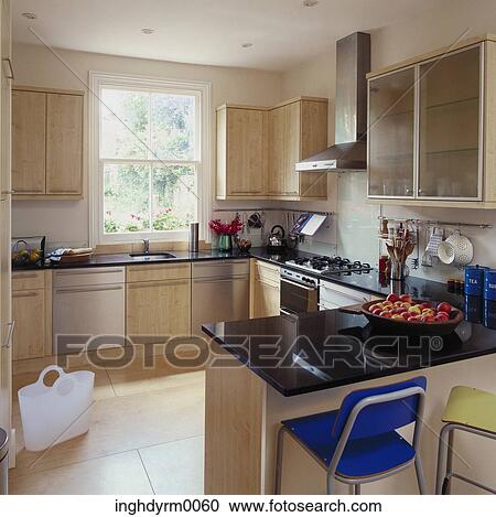 View of a wood and stainless steel kitchen View Large Photo Image Stock Image - View of a wood and stainless steel kitchen. Fotosearch