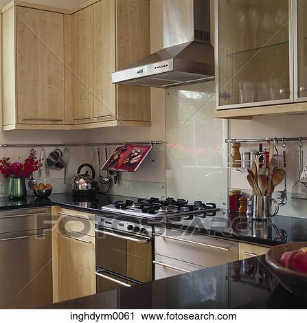 View of a wood and stainless steel kitchen View Large Photo Image Stock Image - View of a wood and stainless steel kitchen. Fotosearch