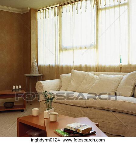 White couch in a living room View Large Photo Image Picture - White couch in a living room. Fotosearch