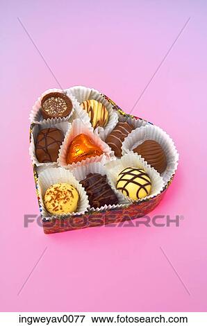 Close-up of a box of assorted chocolates View Large Photo Image Stock Photo - Close-up of a box of assorted chocolates. Fotosearch