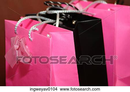 Close-up of three gift bags View Large Photo Image Picture - Close-up of three gift bags. Fotosearch