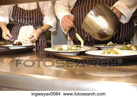 Picture - Cooks preparing a wedding meal. Fotosearch