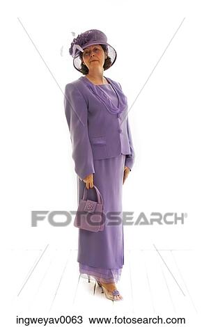 Portrait of a mid adult woman dressed in purple View Large Photo Image Stock Image - Portrait of a mid adult woman dressed in purple. Fotosearch