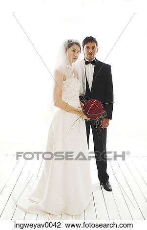 Portrait of a young bride and groom View Large Photo Image Stock Image - Portrait of a young bride and groom. Fotosearch