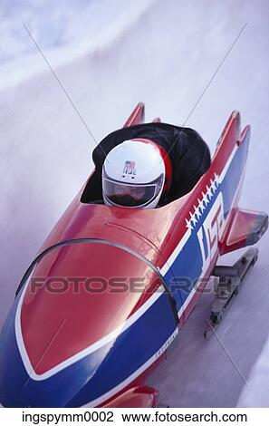 Close-up of a man in a bob sled View Large Photo Image Stock Image - Close-up of a man in a bob sled. Fotosearch