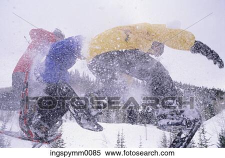 Close-up of skiers in midair View Large Photo Image Stock Photography - Close-up of skiers in midair. Fotosearch