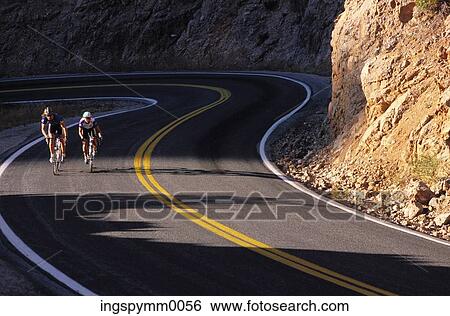 Two bikers on a country road View Large Photo Image Stock Photograph - Two bikers on a country road. Fotosearch
