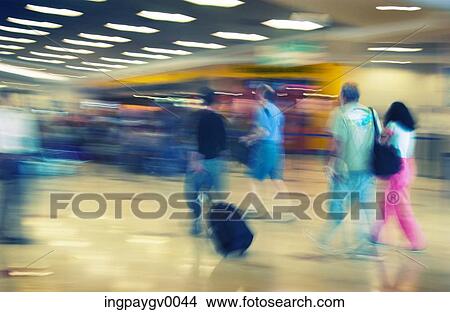 Passengers at an airport View Large Photo Image Picture - Passengers at an airport. Fotosearch