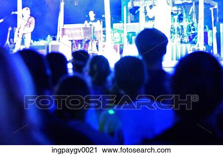 Rear of an audience at a music concert View Large Photo Image Stock Image - Rear of an audience at a music concert. Fotosearch