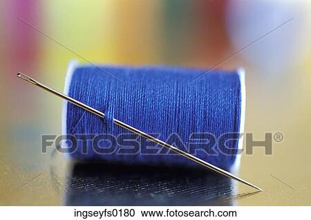 A Needle And Spool of Thread With Rainbow Colors View Large Photo Image Stock Image - A Needle And Spool of Thread With Rainbow Colors. Fotosearch