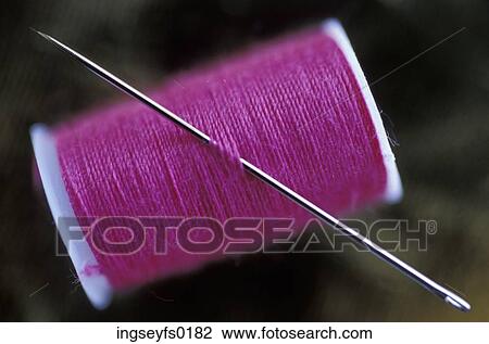 A Needle In A Spool Of Thread View Large Photo Image Stock Image - A Needle In A Spool Of Thread. Fotosearch