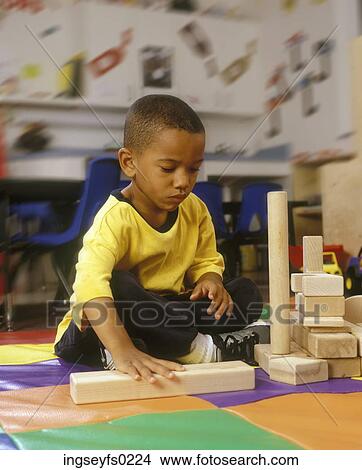 African American Child Playing With Blocks View Large Photo Image Picture - African American Child Playing With Blocks. Fotosearch