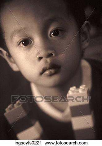Asian American Boy Holding Blocks And Looking At You View Large Photo Image Stock Image - Asian American Boy Holding Blocks And Looking At You. Fotosearch