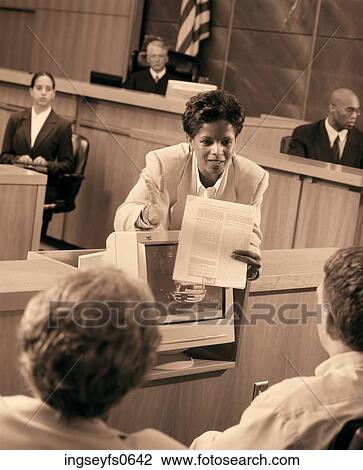 Stock Image - Attorney Presenting Evidence to Jury. Fotosearch