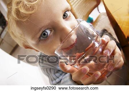 Boy Drinking Out Of Glass View Large Photo Image Stock Image - Boy Drinking Out Of Glass. Fotosearch