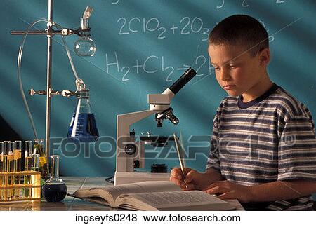 Boy Taking Notes From Textbook In Chemistry Class View Large Photo Image Stock Photo - Boy Taking Notes From Textbook In Chemistry Class. Fotosearch