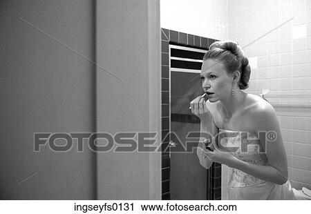 Bride In The Bathroom Putting On Lipstick View Large Photo Image Stock Image - Bride In The Bathroom Putting On Lipstick. Fotosearch